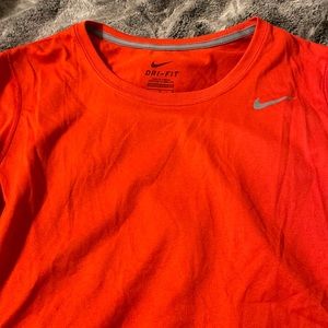 women’s red nike shirt